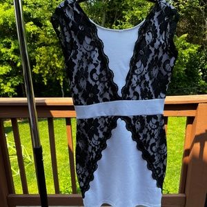 White dress with black lace trim